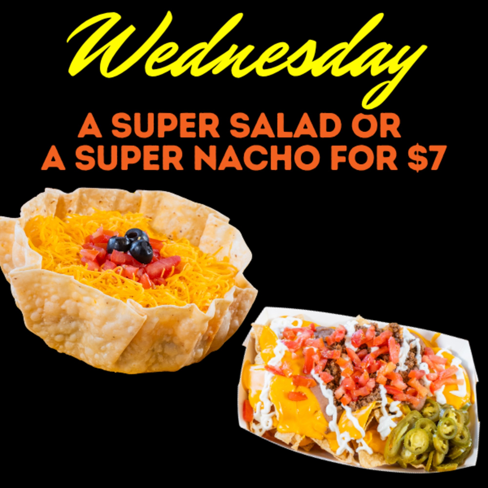 Taco salad in a fried bowl and loaded nachos, advertising a Wednesday $7 deal.